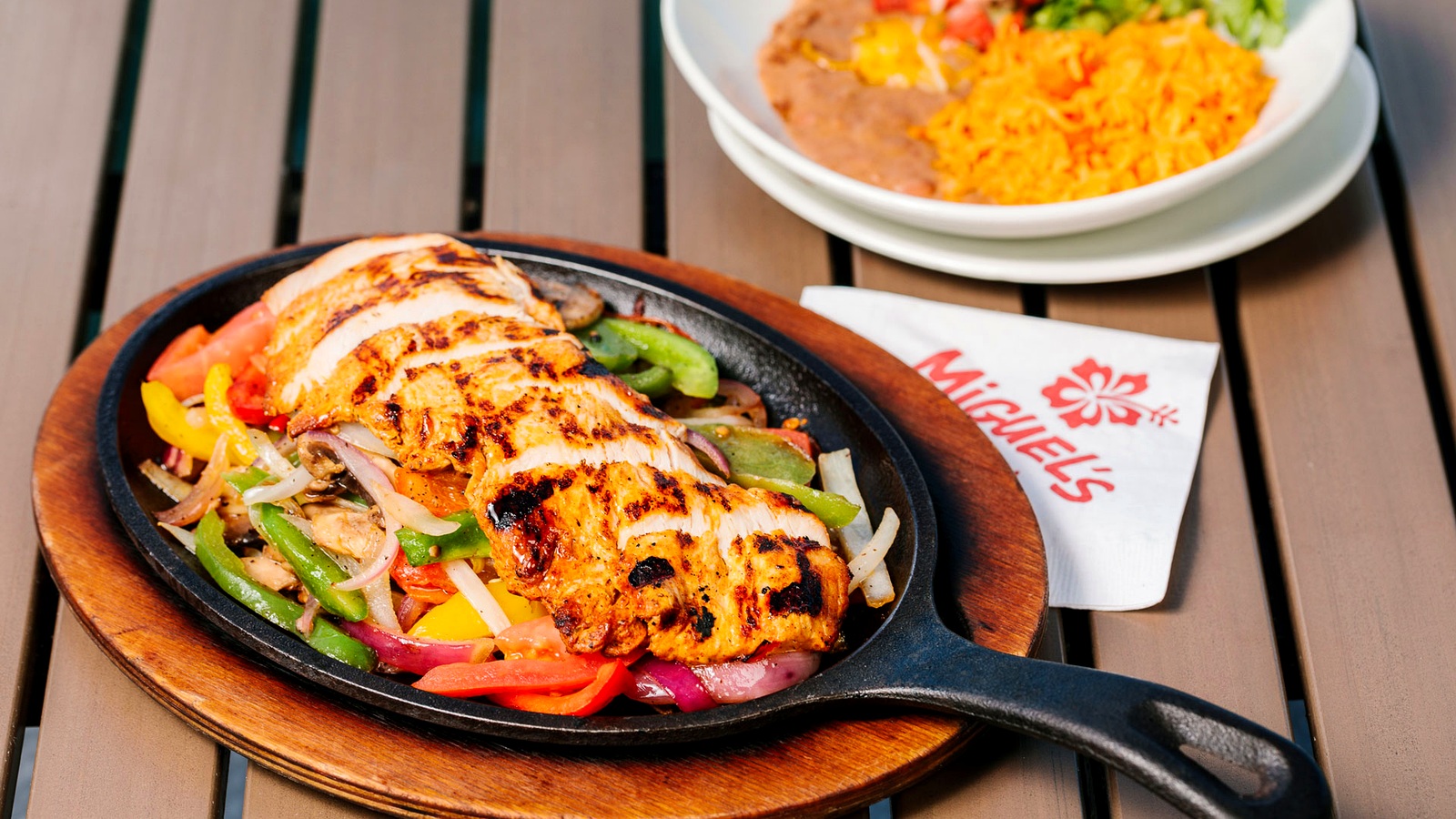 Sizzling chicken fajitas skillet at Miguel’s Cocina